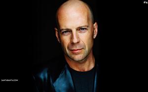 dashing American actor, producer and singer, Walter Bruce Willis